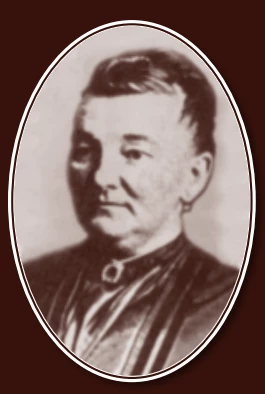 Black and white portrait of a middle-aged woman looking to the left of the camera with short pulled-up hair and wearing a black dress.