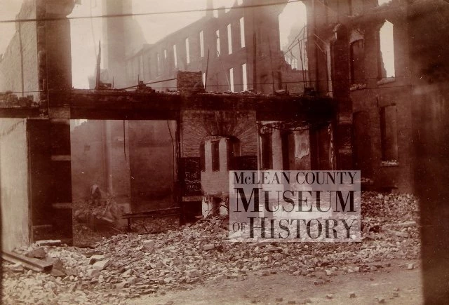 The Model Laundry, in the 100 block of East Monroe Street. Written on a column in white, 